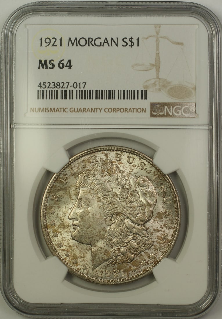 1921 Philadelphia Morgan Dollar Silver $1 NGC MS 64 Light Toning: 1921 Philadelphia Morgan Dollar Silver $1 NGC MS 64 Light Toning This is a 1921 Morgan Silver Dollar $1 coin, certified by NGC with a grade of MS-64. The coin is uncirculated and exhibits light toning