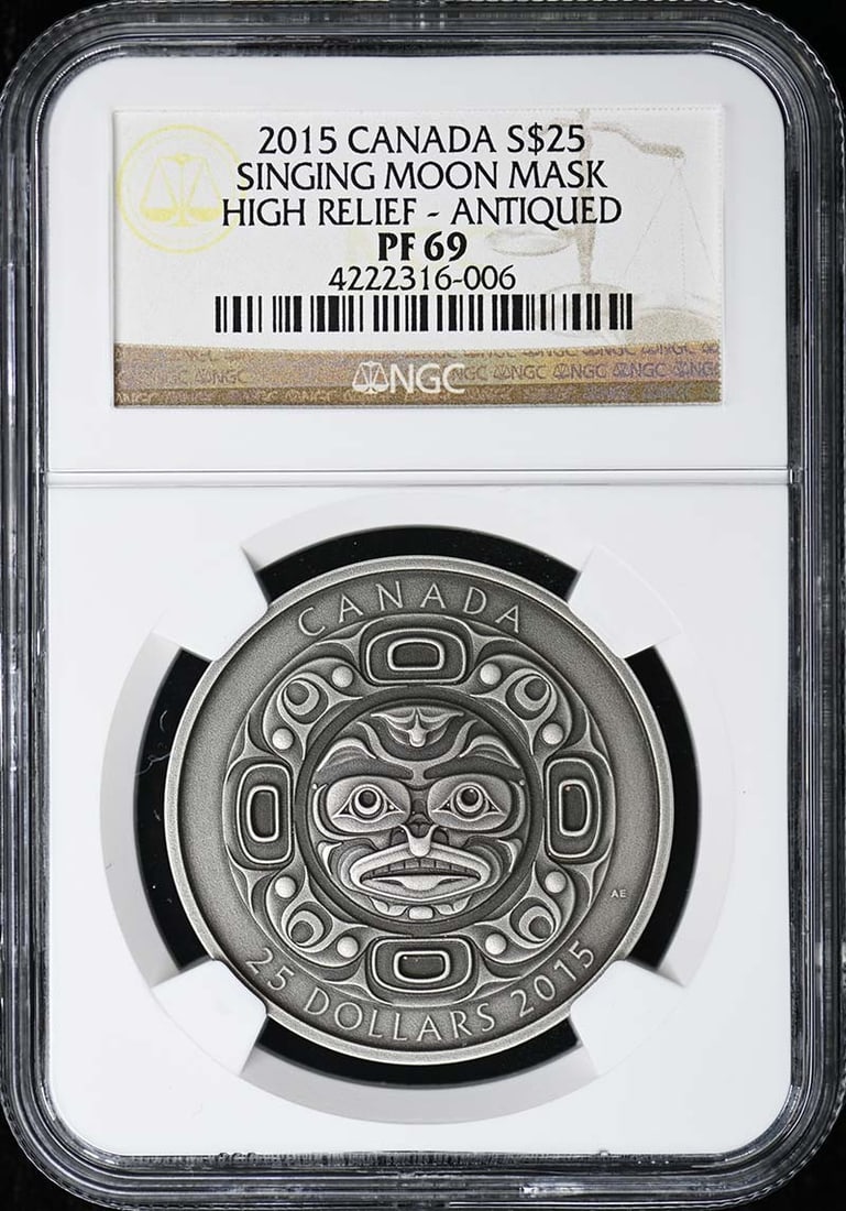 2015 High Relief Singing Moon Mask Silver $25 Coin NGC PR69: 2015 High Relief Singing Moon Mask Silver $25 Coin NGC PR69 This is a 2015 Canada Singing Moon Mask high relief silver $25 coin, graded PR69 by NGC. The coin is uncirculated and has been certified by