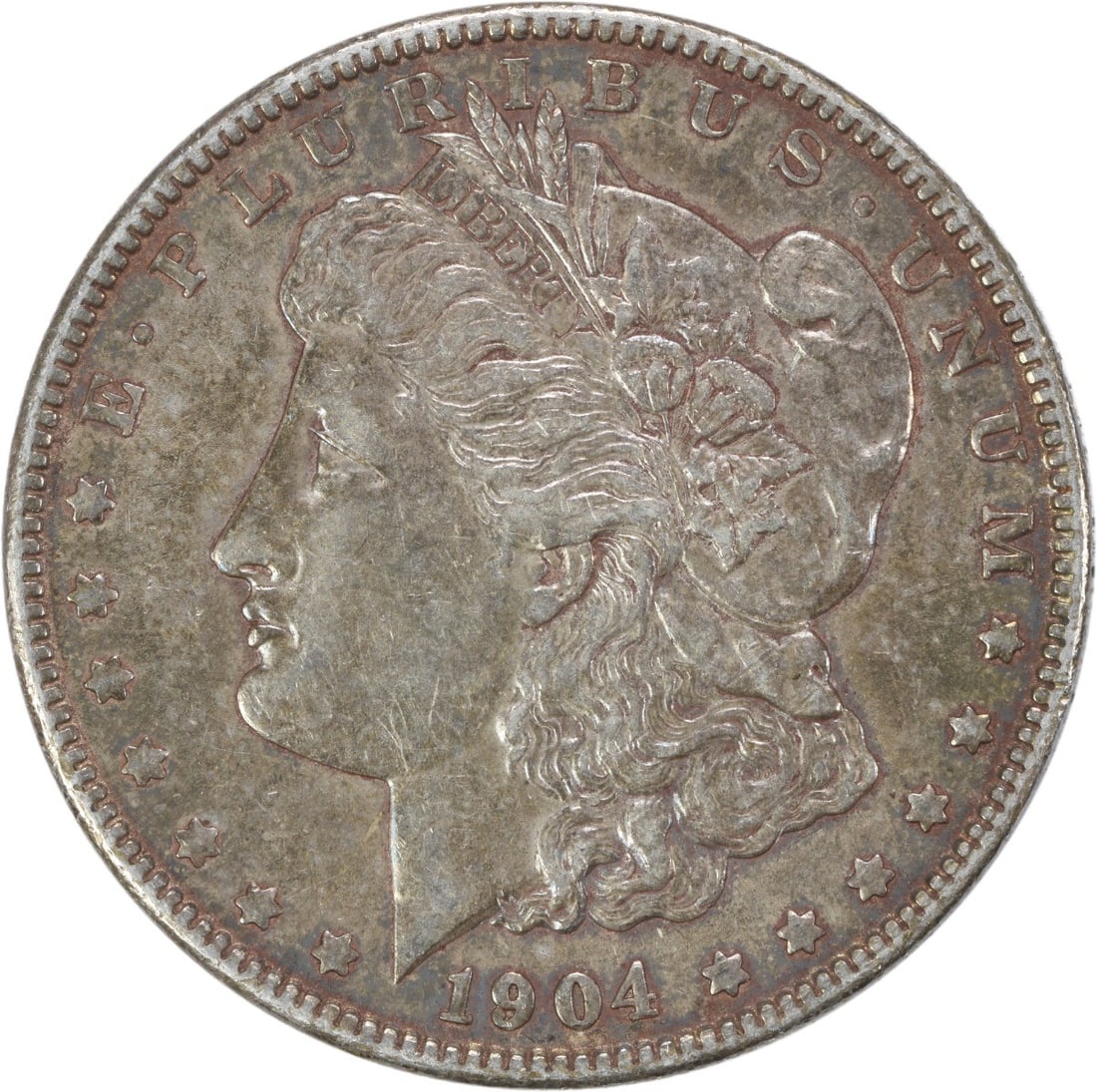 1904 Philadelphia Morgan Dollar Extra Fine Uncertified US Silver Coin: 1904 Philadelphia Morgan Dollar Extra Fine Uncertified US Silver Coin This 1904 Morgan Silver Dollar is an uncertified, circulated coin minted in Philadelphia. Designed by George T. Morgan, it is comp