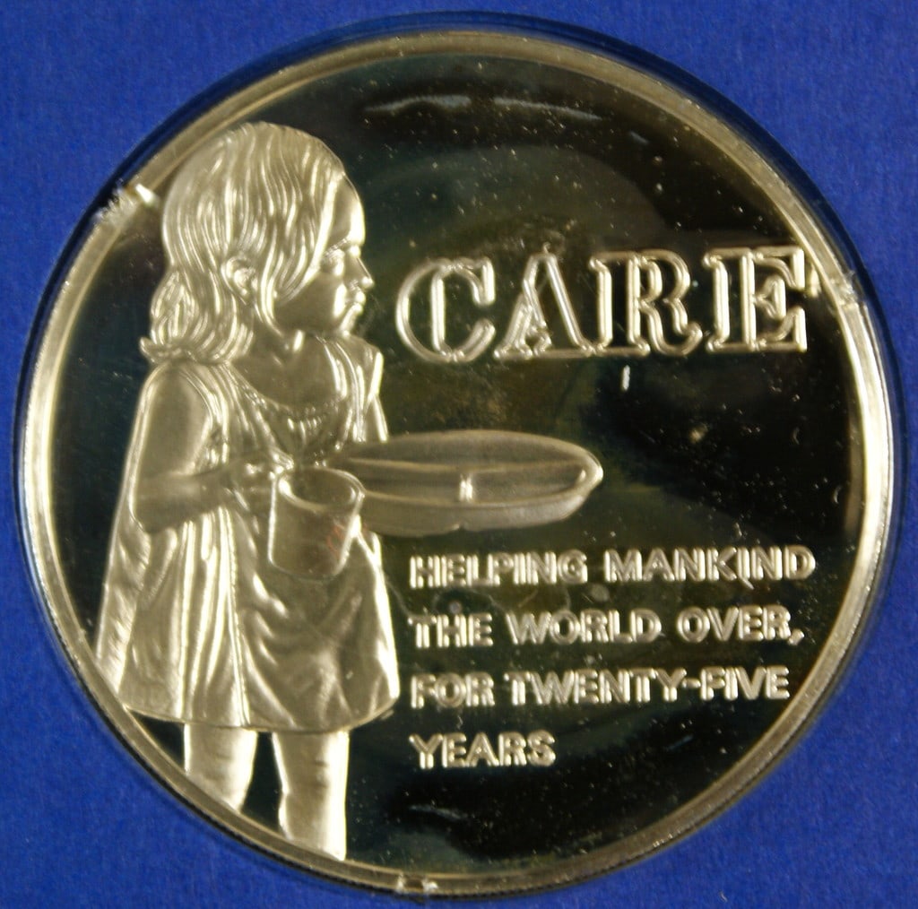Silver Medal Marking CARE 25th Anniversary by Franklin Mint (1 of 4)