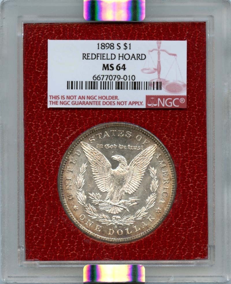 1898-S Morgan Dollar NGC MS64 Redfield Hoard Uncirculated: 1898-S Morgan Dollar NGC MS64 Redfield Hoard Uncirculated This 1898-S Morgan Dollar is a remarkable find from the Redfield Hoard, certified by NGC with a grade of MS64, indicating its uncirculated con