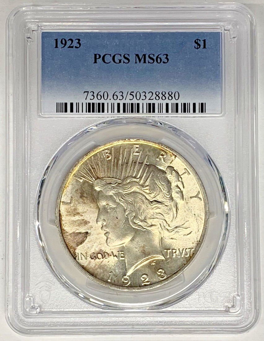 PCGS MS 63 1923 Peace Silver Dollar Light Toning: PCGS MS 63 1923 Peace Silver Dollar Light Toning This 1923 Peace Silver Dollar is graded MS 63 by PCGS and features a lightly toned appearance. It is composed of silver and remains in uncirculated con