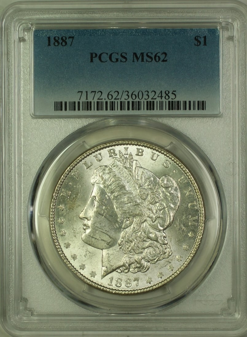 PCGS MS62 1887 Morgan Dollar Silver $1 Coin from Philadelphia Mint: PCGS MS62 1887 Morgan Dollar Silver $1 Coin from Philadelphia Mint This 1887 Morgan Silver Dollar $1 coin is certified by PCGS with a grade of MS-62. Struck in Philadelphia, it is uncirculated and com
