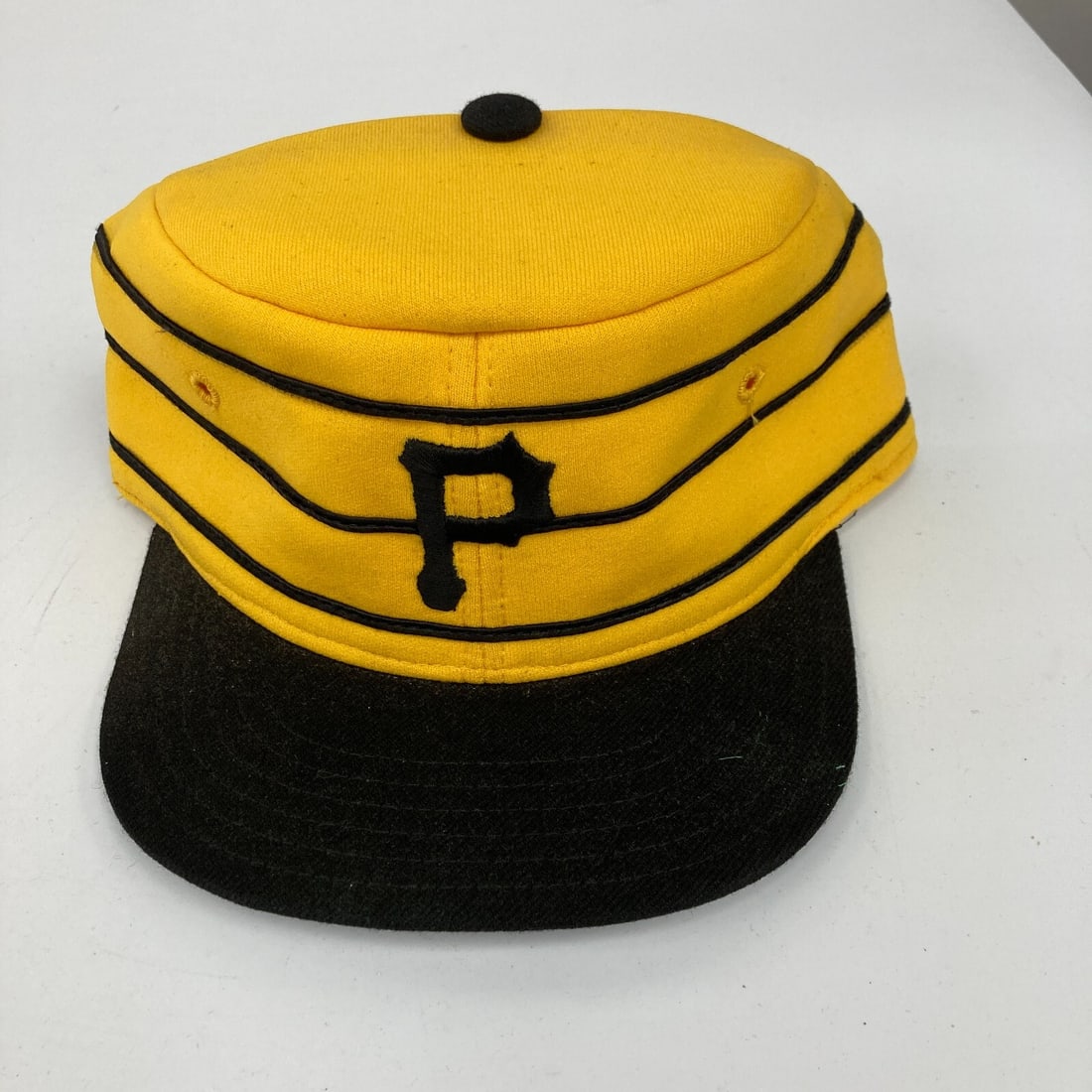 Rare 1970s Pittsburgh Pirates Game-Issued Baseball Cap: Rare 1970s Pittsburgh Pirates Game-Issued Baseball Cap This vintage 1970's baseball cap is a unique piece of memorabilia from the Pittsburgh Pirates, originally issued for team use. This cap was part