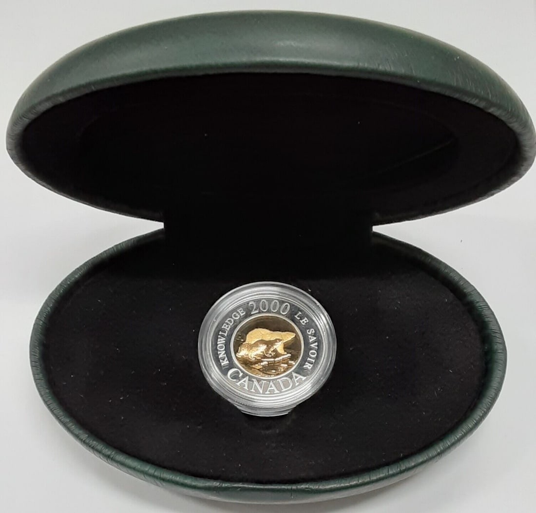 2000 Sterling Silver Proof $2 Coin Polar Bear Gold Plated With Box and COA: 2000 Sterling Silver Proof $2 Coin Polar Bear Gold Plated With Box and COA This is a 2000 Canada Polar Bear $2 proof coin crafted from sterling silver with gold plating. The coin is un-used, comes in