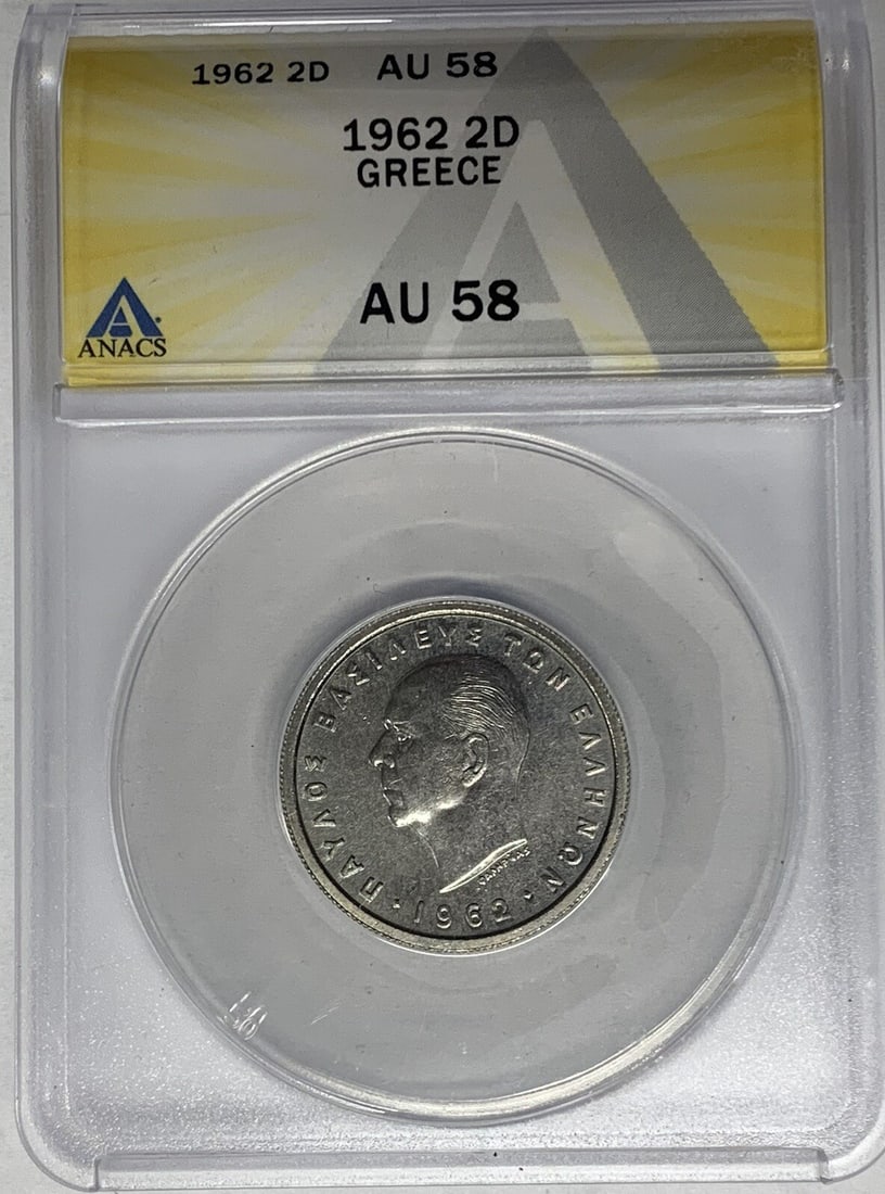 ANACS AU 58 1962 2 Drachmai Copper-Nickel Coin from Greece: ANACS AU 58 1962 2 Drachmai Copper-Nickel Coin from Greece This 1962 Greece 2 Drachmai coin is composed of copper-nickel and is certified by ANACS with a grade of AU 58. The coin is in uncirculated co