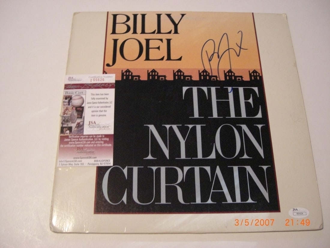 Billy Joel Signed The Nylon Curtain LP Album JSA COA Certified: Billy Joel Signed The Nylon Curtain LP Album JSA COA Certified This authentic Billy Joel "The Nylon Curtain" LP record is signed by the legendary musician himself, making it a must-have for any collec