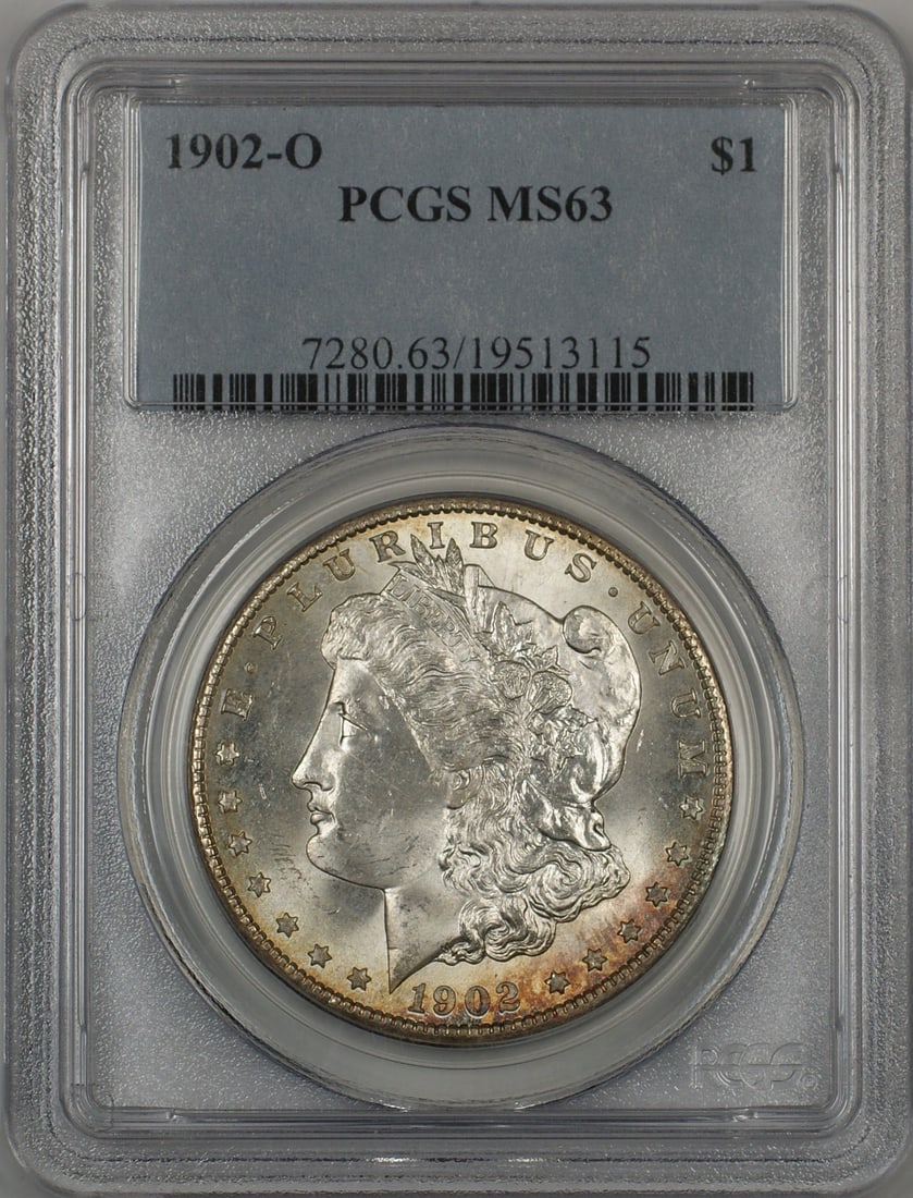PCGS MS63 1902-O Morgan Silver Dollar with Toned Rim: PCGS MS63 1902-O Morgan Silver Dollar with Toned Rim This 1902-O Morgan Silver Dollar is certified by PCGS with a grade of MS-63. Struck at the New Orleans Mint, the coin features a toned rim and is c