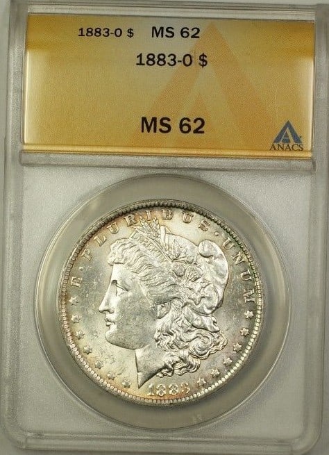 1883-O Morgan Dollar Silver Coin ANACS Graded MS 62 Uncirculated: 1883-O Morgan Dollar Silver Coin ANACS Graded MS 62 Uncirculated This is an 1883-O Morgan Silver Dollar $1 coin, certified by ANACS with a grade of MS-62. Minted in New Orleans, this uncirculated coin
