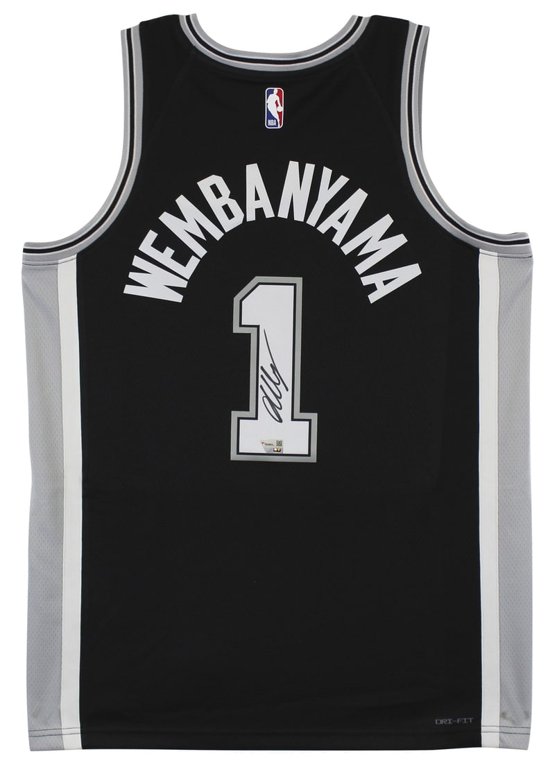 Victor Wembanyama Signed San Antonio Spurs Black Nike Icon Jersey: Victor Wembanyama Signed San Antonio Spurs Black Nike Icon Jersey This authentic black Nike Icon Edition jersey features the signature of Victor Wembanyama, the rising star of the San Antonio Spurs. A
