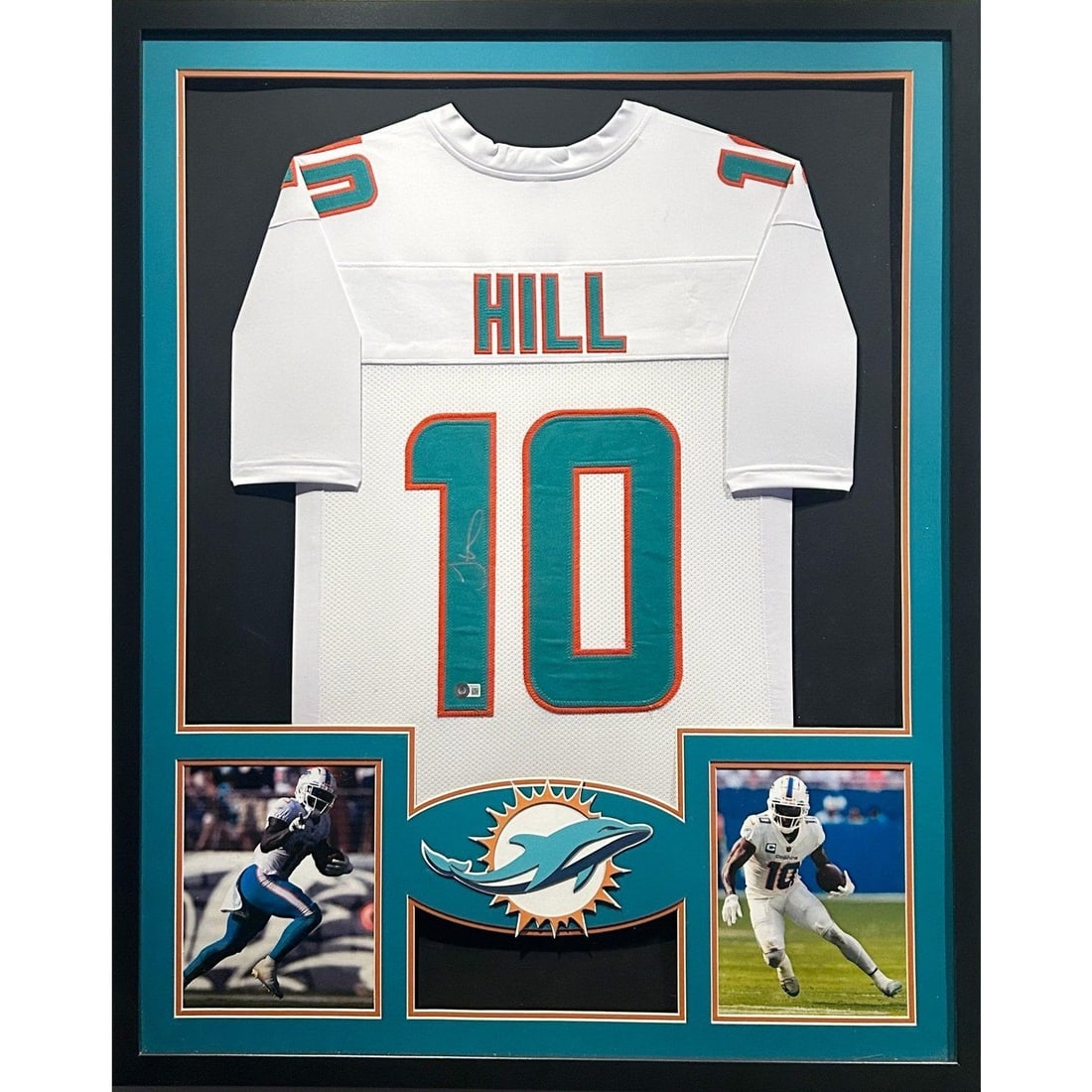 Tyreek Hill Autographed Framed Jersey Miami Dolphins Beckett Authenticated 42x34: Tyreek Hill Autographed Framed Jersey Miami Dolphins Beckett Authenticated 42x34 This stunning autographed Tyreek Hill jersey showcases the Miami Dolphins' colors and is professionally framed for disp