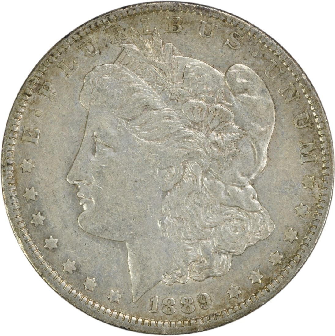 1889-O Morgan Silver Dollar 90% Silver Uncertified EF Coin: 1889-O Morgan Silver Dollar 90% Silver Uncertified EF Coin This 1889-O Morgan Silver Dollar is a classic collectible coin that showcases the artistry of George T. Morgan. Struck at the New Orleans min