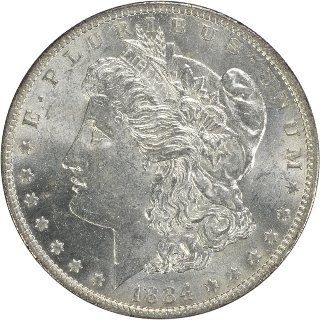 1884-O Morgan Silver Dollar BU Uncertified Silver Coin: 1884-O Morgan Silver Dollar BU Uncertified Silver Coin This 1884-O Morgan Silver Dollar is an uncirculated coin featuring a stunning finish. Struck in silver, this coin showcases the iconic Morgan des