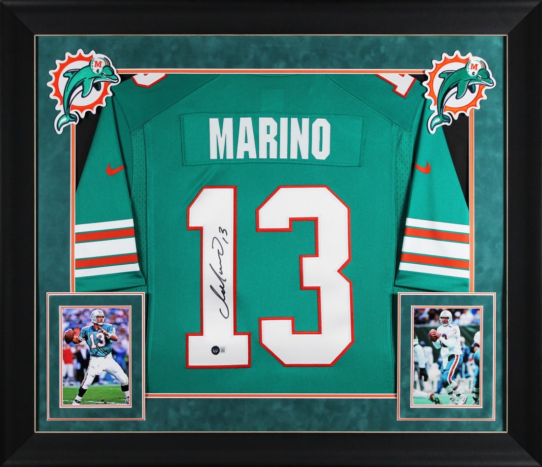 Dan Marino Signed Teal Nike Limited Framed Jersey BAS Miami Dolphins: Dan Marino Signed Teal Nike Limited Framed Jersey BAS Miami Dolphins Celebrate the legacy of NFL legend Dan Marino with this authentic autographed teal Nike limited framed jersey. This original Miami