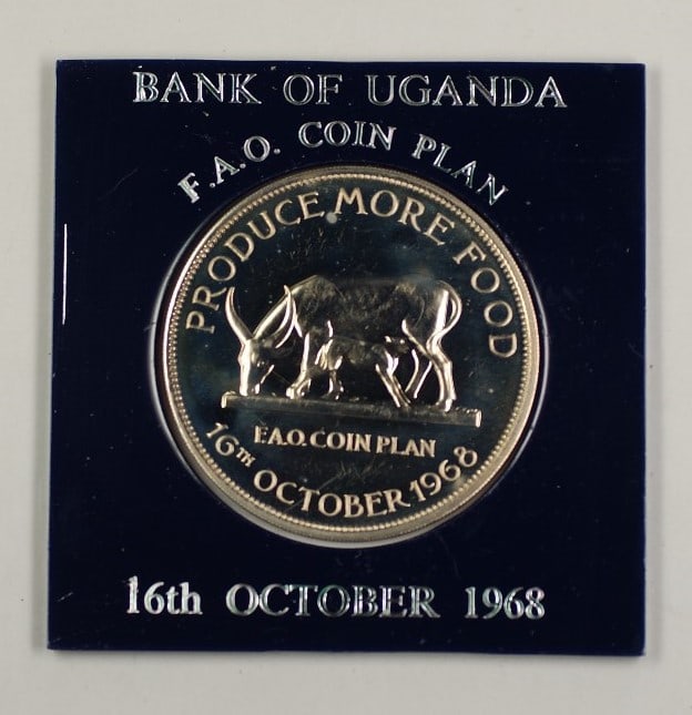 5 Shillings 1968 Uganda FAO Grow More Food Copper-Nickel Coin in Display Case: 5 Shillings 1968 Uganda FAO Grow More Food Copper-Nickel Coin in Display Case This 1968 Bank of Uganda FAO 5 Shillings coin commemorates the 'Plan Grow More Food' initiative. Struck in copper-nickel,