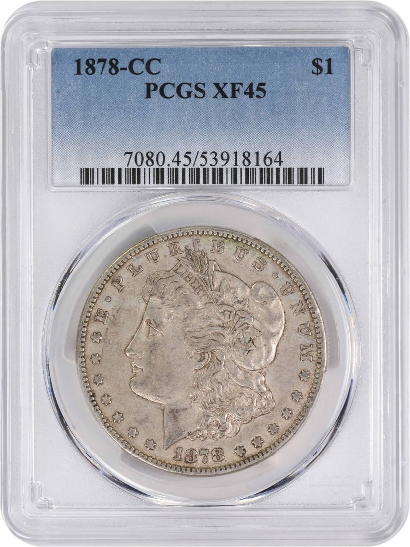 1878-CC Morgan Silver Dollar EF45 PCGS Certified Coin: 1878-CC Morgan Silver Dollar EF45 PCGS Certified Coin This 1878-CC Morgan Silver Dollar is a remarkable piece of numismatic history, featuring the iconic design by George T. Morgan. Struck at the Cars