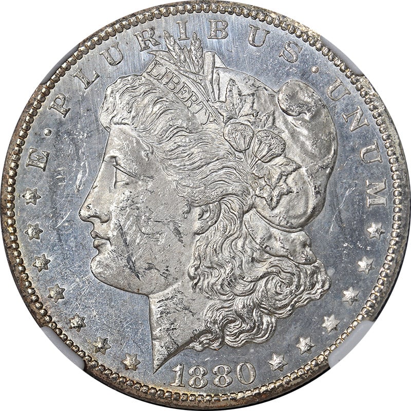1880-CC Morgan Silver Dollar NGC MS61 PL Blast White Coin: 1880-CC Morgan Silver Dollar NGC MS61 PL Blast White Coin This original 1880-CC Morgan Silver Dollar showcases superb eye appeal, featuring fantastic luster and a strong strike. It is certified by NGC