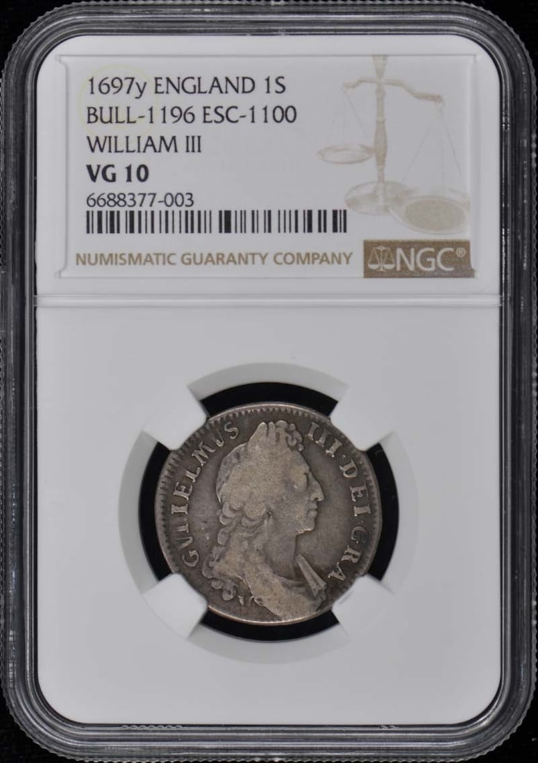 England ESC-1100 1 Shilling NGC Graded VG10 Certified Coin: England ESC-1100 1 Shilling NGC Graded VG10 Certified Coin This is a circulated 1697 England ESC-1100 1 Shilling coin, certified by NGC with a grade of VG10. The coin originates from the United Kingdo