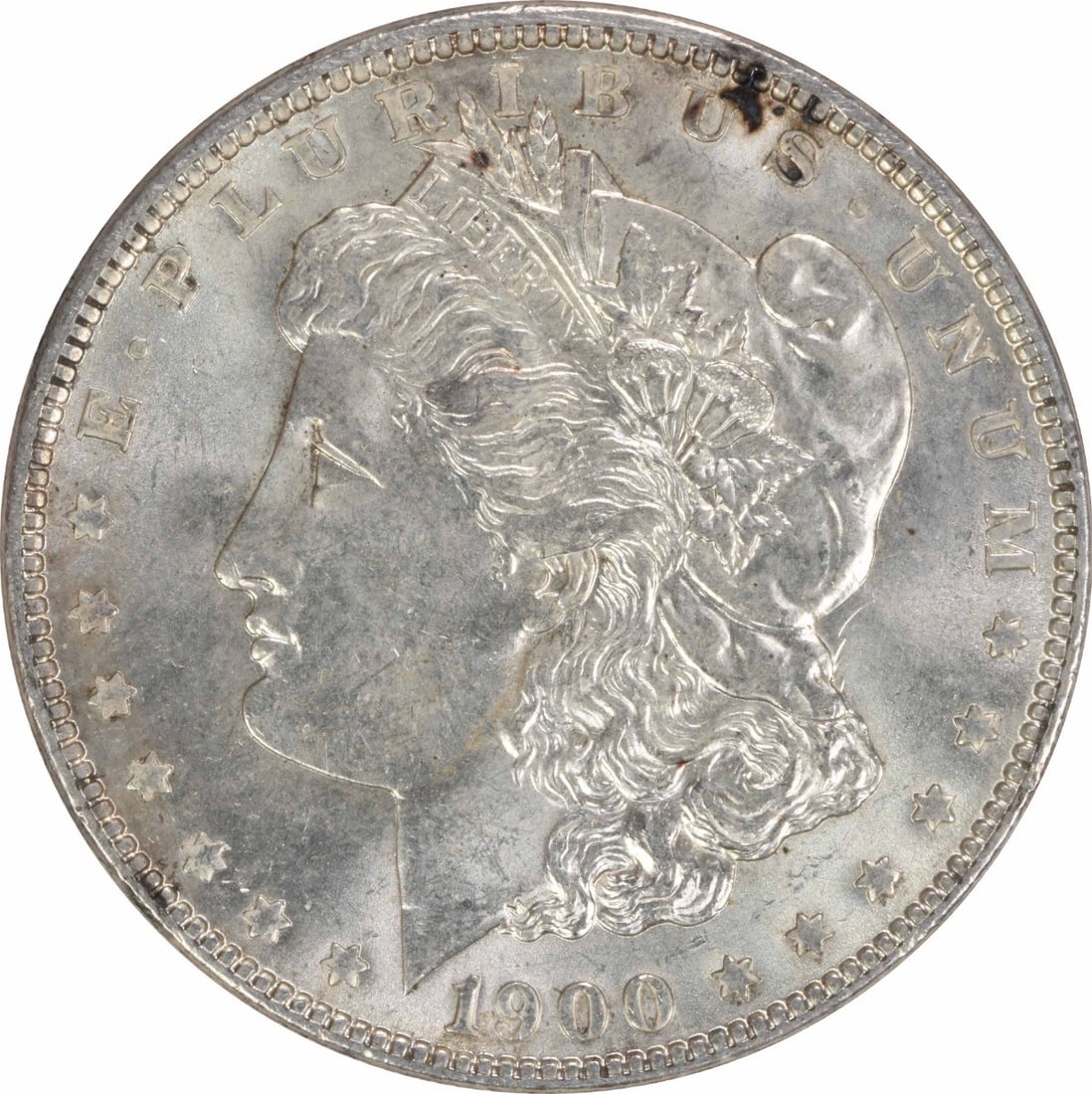 1900 Morgan Silver Dollar Uncertified Brilliant Uncirculated Silver Coin: 1900 Morgan Silver Dollar Uncertified Brilliant Uncirculated Silver Coin This 1900 Morgan Silver Dollar is an uncirculated coin in brilliant uncirculated (BU) condition. Struck from silver, this coin