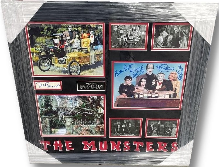 The Munsters Autographed Cast Photo Framed JSA Authenticated 26x27: The Munsters Autographed Cast Photo Framed JSA Authenticated 26x27 This original signed cast photo from the beloved series The Munsters features the autographs of Fred Gwynne, Yvonne De Carlo, Al Lewi