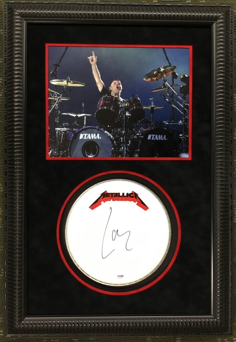 Lars Ulrich Signed Drumhead Display Framed PSA Authenticated: Lars Ulrich Signed Drumhead Display Framed PSA Authenticated This professionally framed display features a drumhead signed by Lars Ulrich, the legendary drummer of the iconic rock band Metallica. The