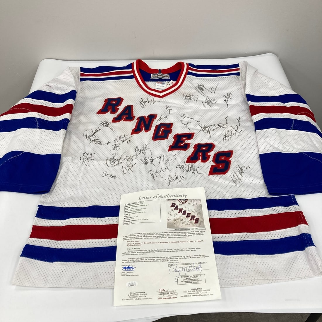 New York Rangers 1994-95 Team Autographed Jersey with JSA Full Letter: New York Rangers 1994-95 Team Autographed Jersey with JSA Full Letter This is an authentic New York Rangers jersey from the 1994-95 season, team-signed by 26 members including Brian Leetch, Alexei Kov