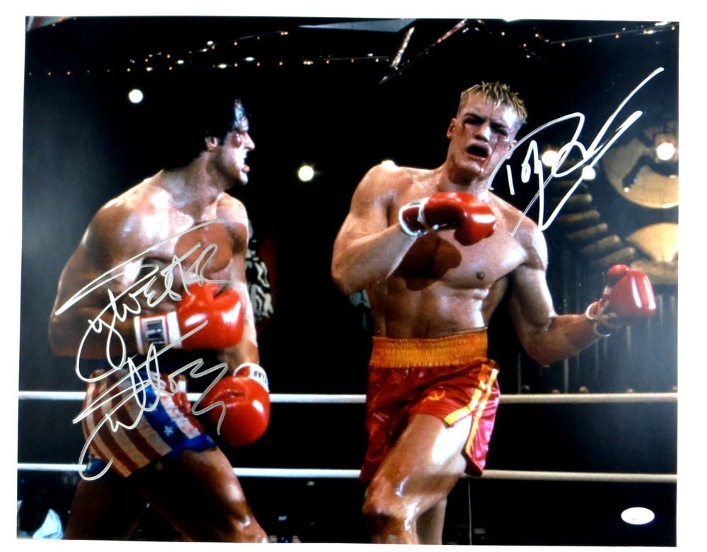 Sylvester Stallone Dolph Lundgren Signed 16x20 Photo Rocky IV JSA: Sylvester Stallone Dolph Lundgren Signed 16x20 Photo Rocky IV JSA This stunning 16x20 photograph features the iconic duo Sylvester Stallone and Dolph Lundgren from the classic film Rocky IV. Both acto