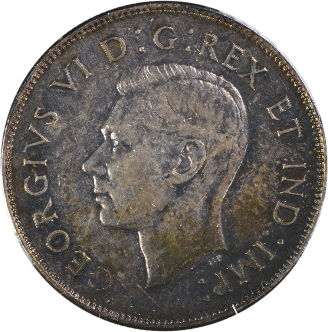 Canada 1947 50 Cent Coin Narrow Date Curved 7 KM36 Uncertified AU: Canada 1947 50 Cent Coin Narrow Date Curved 7 KM36 Uncertified AU This is a 1947 Canada 50 cents coin featuring the Narrow Date with Curved 7 variety. The coin is un-certified and has an approximate g