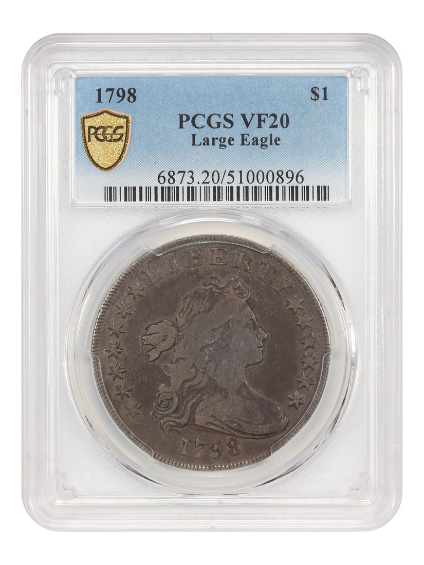 1798 Draped Bust Silver Dollar Large Eagle PCGS VF20: 1798 Draped Bust Silver Dollar Large Eagle PCGS VF20 This 1798 Draped Bust Dollar features the Large Eagle reverse and is graded VF20 by PCGS. The coin displays deep, even toning and consistent wear t