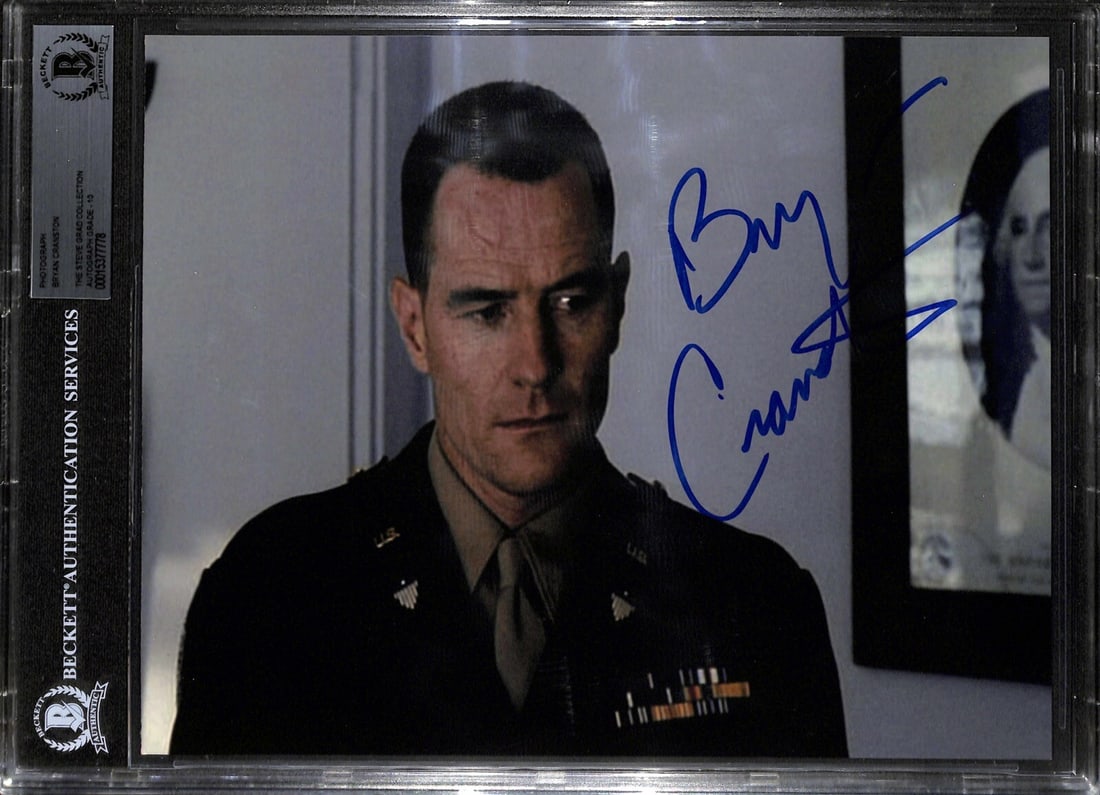 Bryan Cranston Signed 8x10 Photo BAS Grade 10 Beckett: Bryan Cranston Signed 8x10 Photo BAS Grade 10 Beckett This is an autographed 8x10 color photograph of actor Bryan Cranston, signed in blue permanent marker. The photo is from the film 'Saving Private