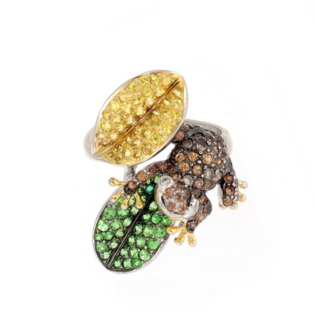 Charming 2.52ct Sapphire Tsavorite Frog Ring in 14k Gold: Charming 2.52ct Sapphire Tsavorite Frog Ring in 14k Gold This enchanting ring showcases a delightful design featuring a frog resting on a leaf, elegantly crafted from 14k black, yellow, and white gold