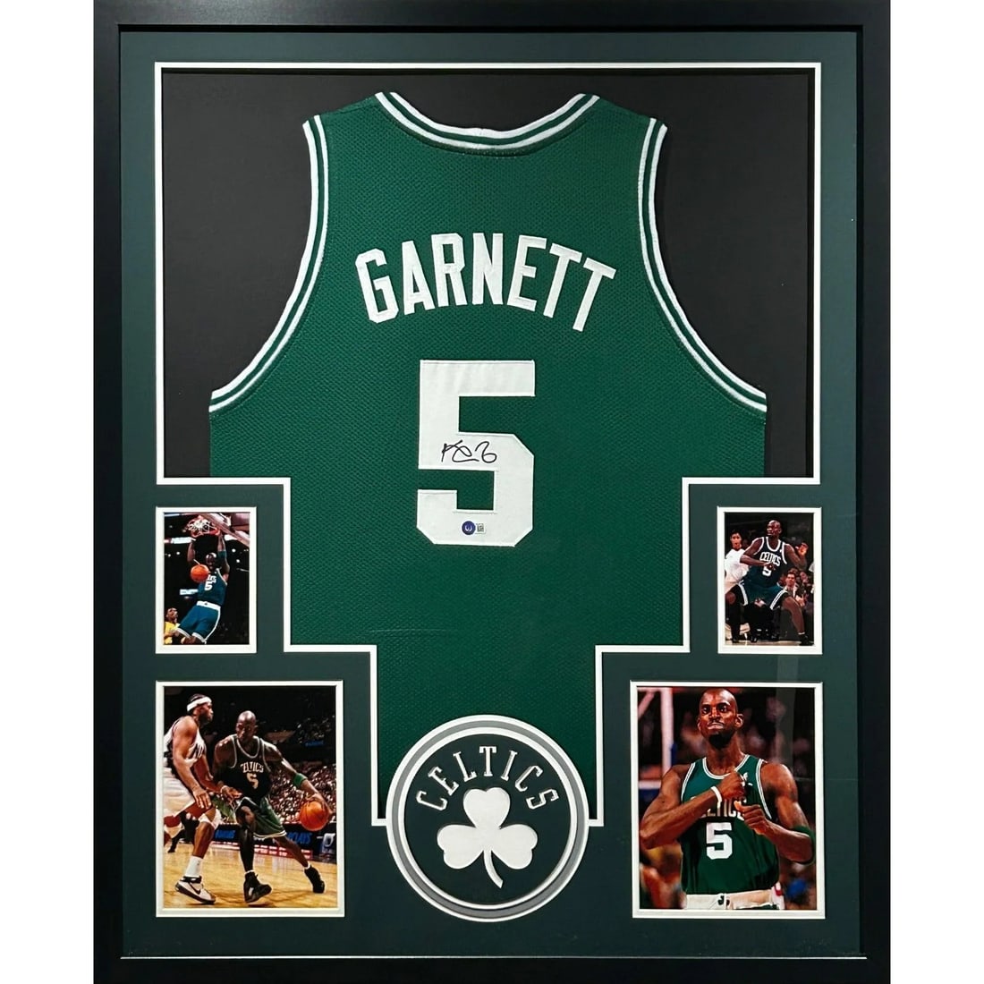 Kevin Garnett Signed Celtics Jersey Framed Beckett Authenticated 42x34: Kevin Garnett Signed Celtics Jersey Framed Beckett Authenticated 42x34 This autographed Kevin Garnett framed jersey is a must-have for any Celtics fan. Authenticated by Beckett, a leading name in spor