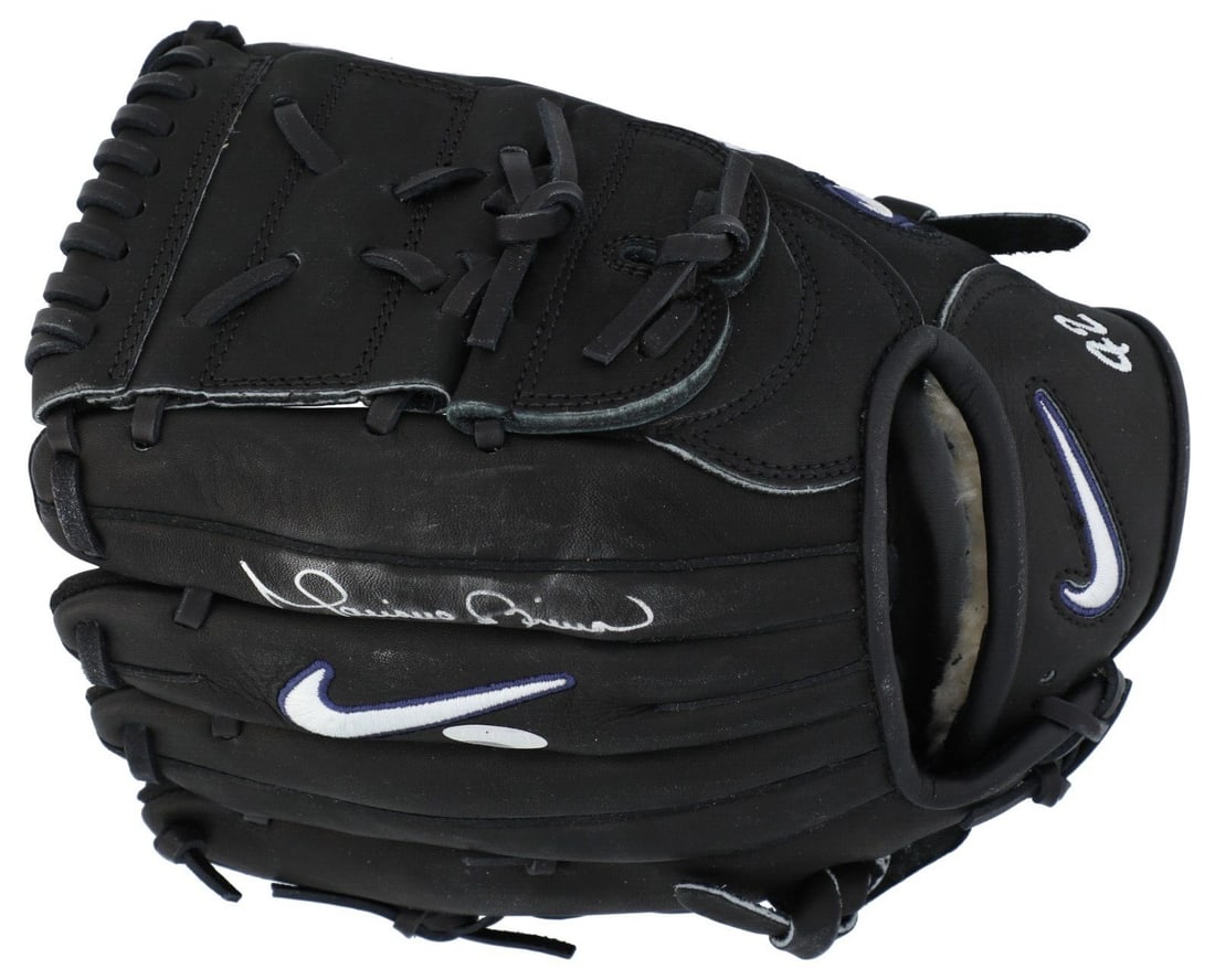 Mariano Rivera Signed Nike Pro Gold MO42 Glove with Steiner COA: Mariano Rivera Signed Nike Pro Gold MO42 Glove with Steiner COA This authentic Nike Pro Gold MO42 Game Model baseball glove is signed by Hall of Famer Mariano Rivera. The glove features a silver marke