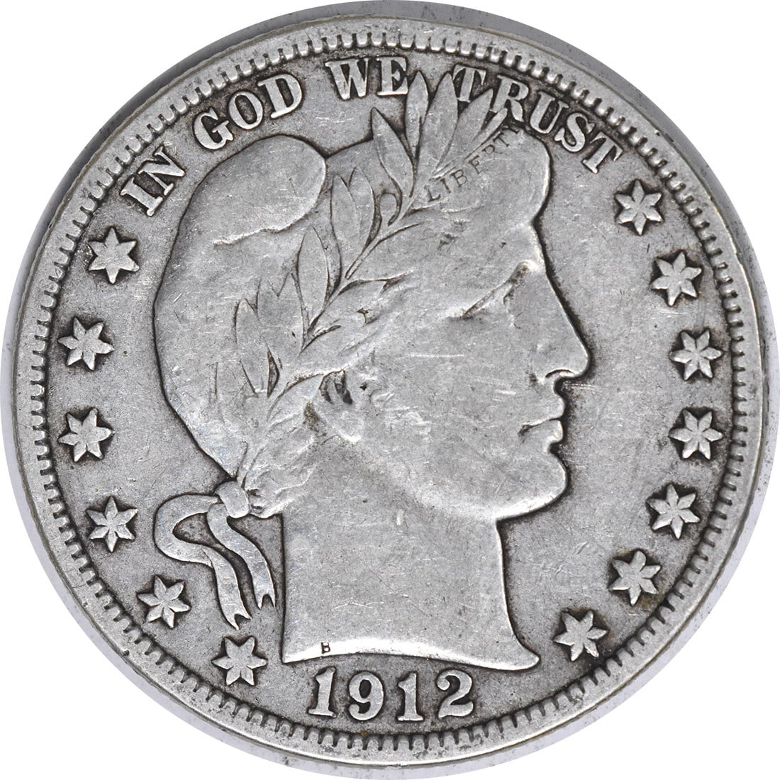 1912-S Barber Half Dollar 50C VF Uncertified Silver Coin: 1912-S Barber Half Dollar 50C VF Uncertified Silver Coin This 1912-S Barber Silver Half Dollar is a remarkable piece of American numismatic history. Designed by Charles E. Barber, this coin was minted