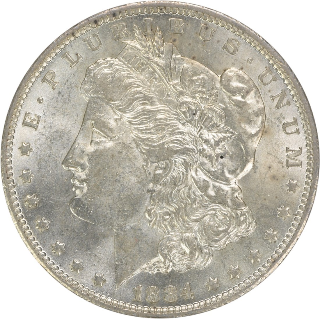 1884-O Morgan Silver Dollar BU Uncertified Silver Coin: 1884-O Morgan Silver Dollar BU Uncertified Silver Coin This 1884-O Morgan Silver Dollar showcases a stunning uncirculated condition, featuring a beautiful shine and detail typical of coins in Brillian