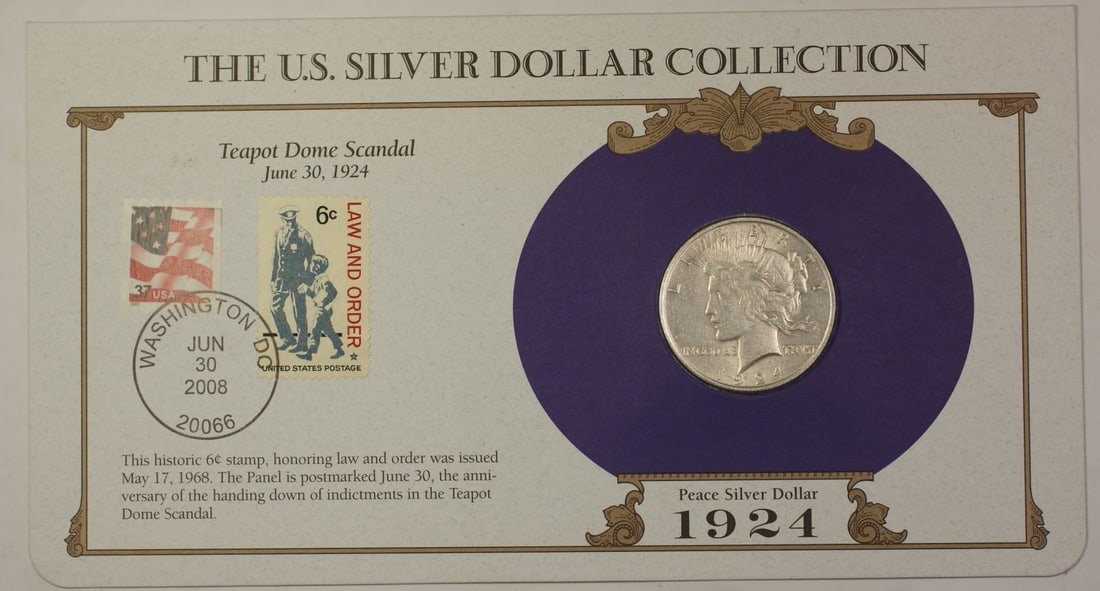 1924 Peace Dollar Silver Coin with Two Stamps in PCS Postmarked Holder: 1924 Peace Dollar Silver Coin with Two Stamps in PCS Postmarked Holder This 1924 Peace Silver Dollar $1 coin was minted in Philadelphia and is composed of silver. It is presented in a Postmarked Infor