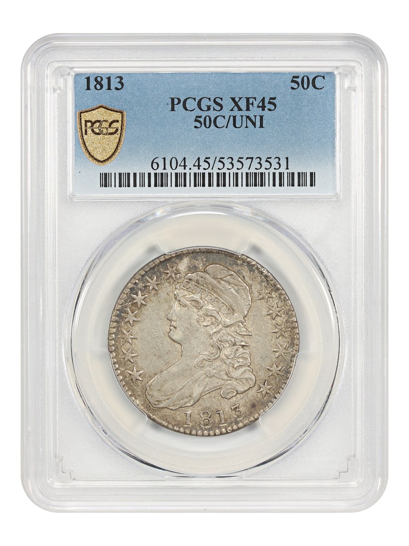 Capped Bust 1813 Half Dollar Variety PCGS XF45 50C over UNI: Capped Bust 1813 Half Dollar Variety PCGS XF45 50C over UNI This 1813 Capped Bust Half Dollar is graded XF45 by PCGS and features the distinctive 50C over UNI variety. Struck in Philadelphia, this cir