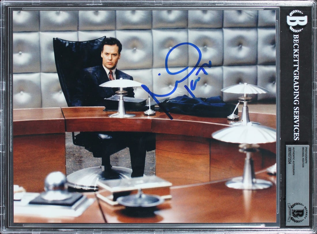 Michael Keaton Signed Batman 8x10 Photo Beckett Authenticated Slabbed: Michael Keaton Signed Batman 8x10 Photo Beckett Authenticated Slabbed This authentic 8x10 horizontal photograph features the signature of Michael Keaton, renowned for his portrayal of Batman. The phot