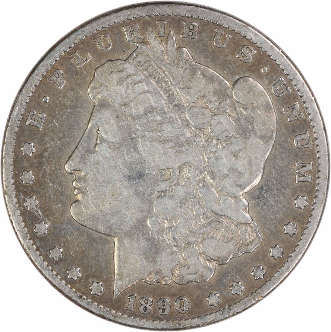 Carson City 1890 CC Morgan Dollar VG Grade Uncertified US Silver Coin: Carson City 1890 CC Morgan Dollar VG Grade Uncertified US Silver Coin This is an 1890 Morgan Silver Dollar minted in Carson City. The coin is composed of 90% silver and 10% copper, features a reeded e
