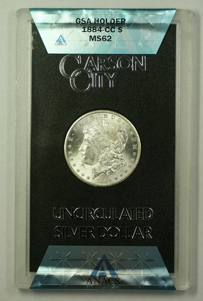 ANACS MS-62 1884-CC Carson City GSA Morgan Silver Dollar with Box and COA: ANACS MS-62 1884-CC Carson City GSA Morgan Silver Dollar with Box and COA This 1884-CC GSA Morgan Silver Dollar is an uncirculated $1 coin minted in Carson City. Graded MS-62 by ANACS, it features a 0