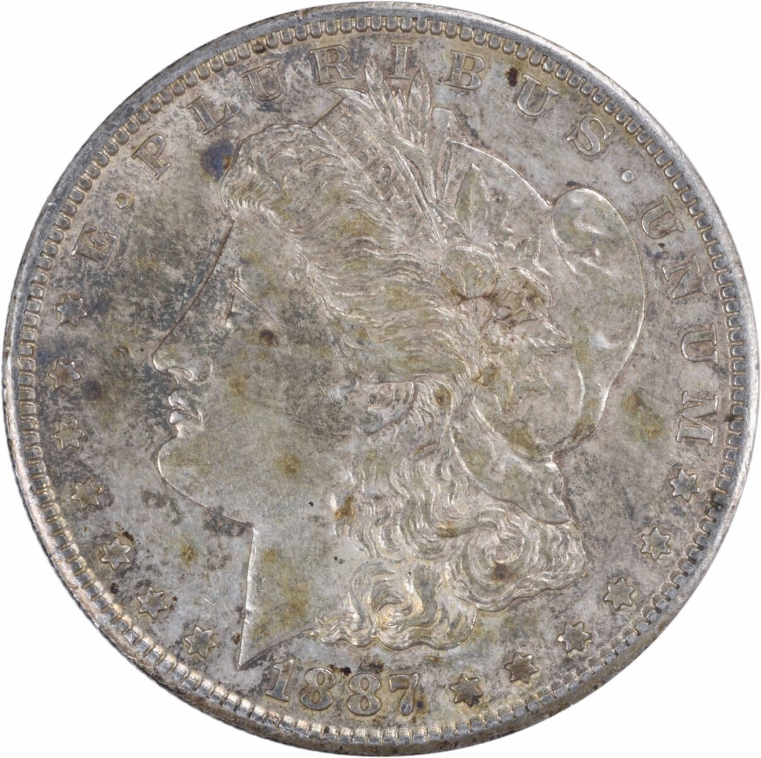 1887-S Morgan Silver Dollar AU Uncertified Coin by George T. Morgan: 1887-S Morgan Silver Dollar AU Uncertified Coin by George T. Morgan This 1887-S Morgan Silver Dollar is a beautiful piece of history, featuring a grade of About Uncirculated (AU). Minted in San Franci