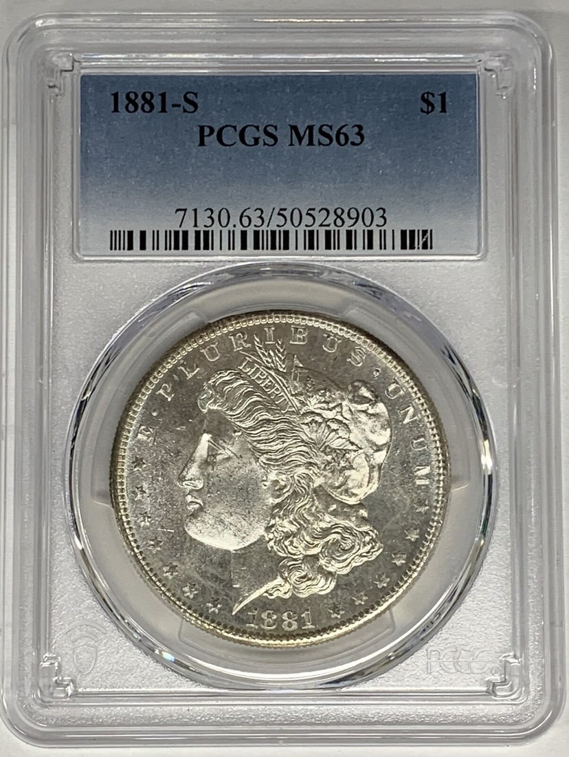 Proof-Like 1881-S Morgan Dollar Silver Coin PCGS MS 63 Certified: Proof-Like 1881-S Morgan Dollar Silver Coin PCGS MS 63 Certified This is an 1881-S Morgan Silver Dollar with a proof-like obverse, graded MS 63 by PCGS. The coin is uncirculated and composed of silver