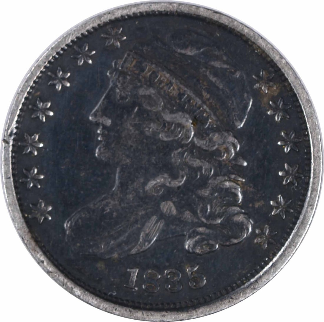 1835 Capped Bust Silver Dime VF Uncertified 10C Philadelphia: 1835 Capped Bust Silver Dime VF Uncertified 10C Philadelphia This 1835 Capped Bust Silver Dime is a circulated coin featuring a design by John Reich. It is composed of 89.2% silver and 10.8% copper, r