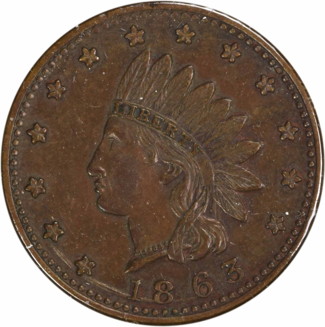 Indian Head 1863 Patriotic Civil War Token Uncirculated Type 79/351: Indian Head 1863 Patriotic Civil War Token Uncirculated Type 79/351 This 1863 Civil War token features an Indian Head Patriotic design and is in uncirculated condition. It originates from the United S