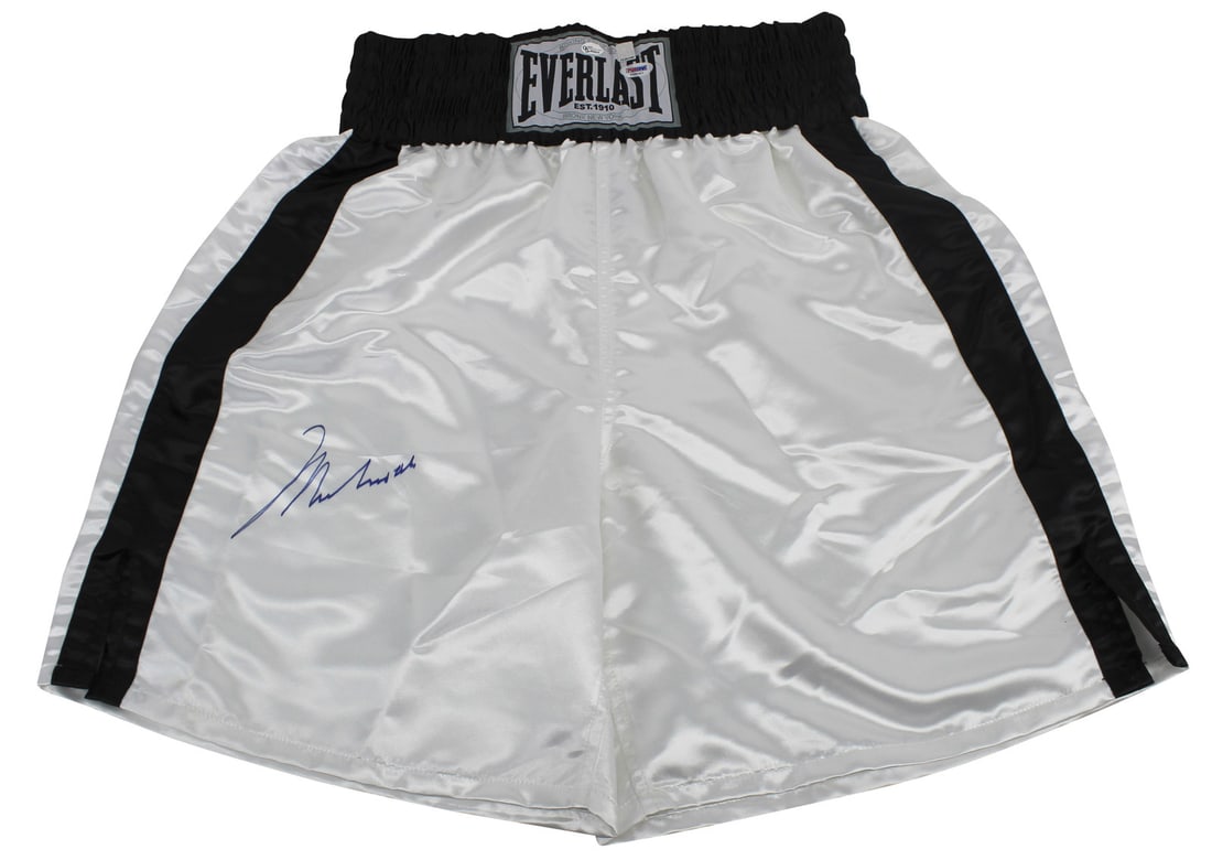 Muhammad Ali Signed White Everlast Boxing Trunks PSA/DNA Certified: Muhammad Ali Signed White Everlast Boxing Trunks PSA/DNA Certified Own a piece of boxing history with these authentic white Everlast boxing trunks personally signed by the legendary Muhammad Ali. This