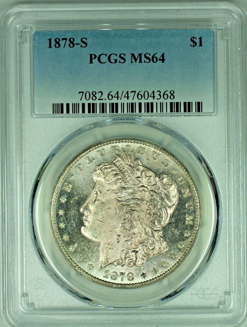 PCGS MS 64 1878-S Morgan Dollar Silver Toned Uncirculated Coin: PCGS MS 64 1878-S Morgan Dollar Silver Toned Uncirculated Coin This is an 1878-S Morgan Silver Dollar from the United States, certified by PCGS with a grade of MS 64. The coin is uncirculated and feat