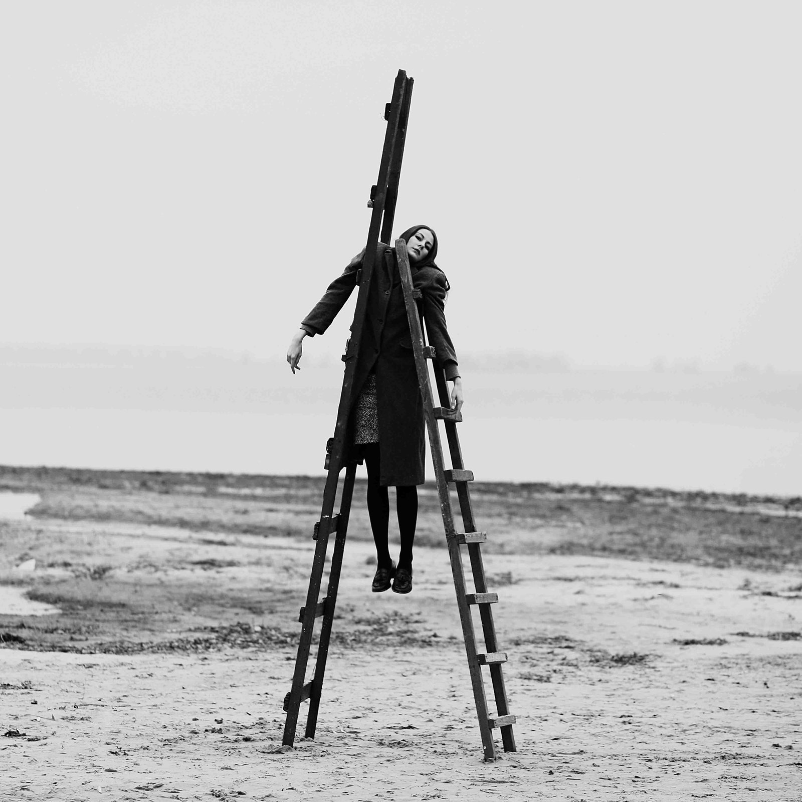 Olha Stepanian Loneliness Black & White Photography Ed. of 7 31" x 31": Olha Stepanian Loneliness Black & White Photography Ed. of 7 31" x 31" Experience the evocative power of "Loneliness," a stunning black and white photograph by Olha Stepanian. This contemporary piece,