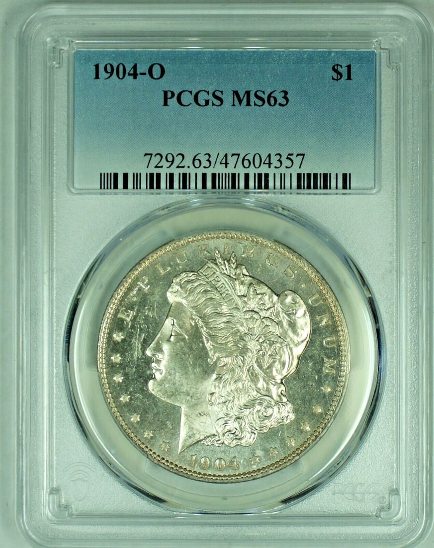 PCGS MS 63 1904-O Morgan Dollar Semi-PL Certified Silver Coin: PCGS MS 63 1904-O Morgan Dollar Semi-PL Certified Silver Coin This 1904-O Morgan Silver Dollar is an un-used coin certified by PCGS with a grade of MS 63. It features a semi-prooflike appearance and i