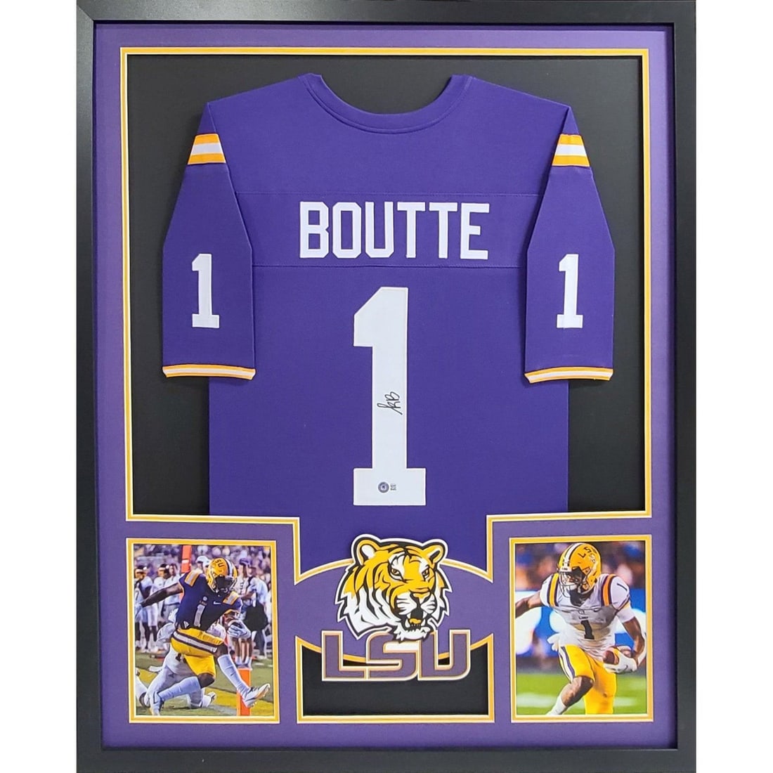 Framed Kayshon Boutte LSU Jersey Signed With Beckett Authentication: Framed Kayshon Boutte LSU Jersey Signed With Beckett Authentication This is a framed, autographed Kayshon Boutte LSU football jersey. The jersey features a signature authenticated by Beckett and inclu