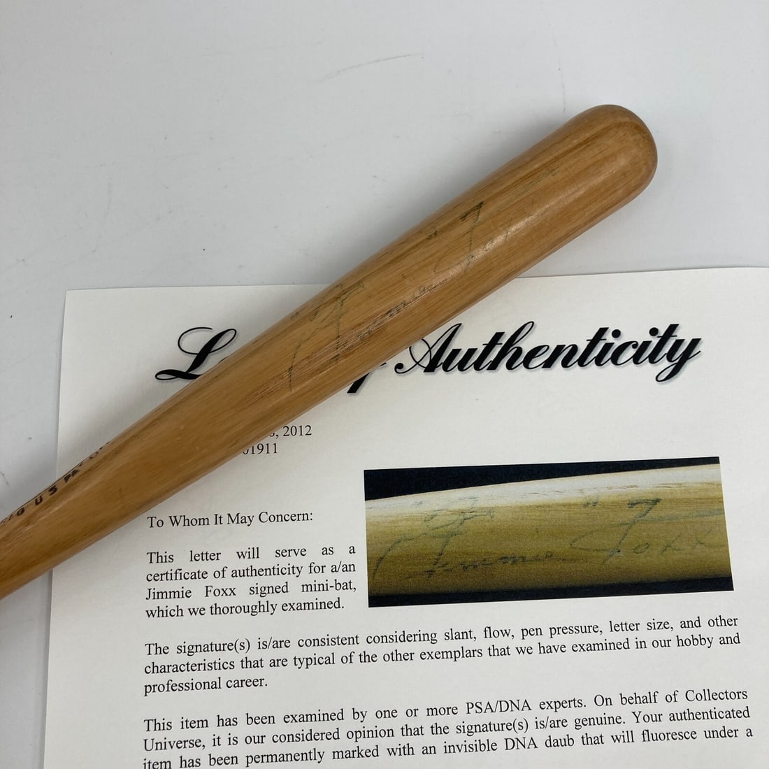 Jimmie Foxx Signed Mini Baseball Bat All-American Daisies PSA Authenticated: Jimmie Foxx Signed Mini Baseball Bat All-American Daisies PSA Authenticated This unique mini baseball bat, measuring 16" in length, is a remarkable collectible signed by Hall of Famer Jimmie Foxx. It